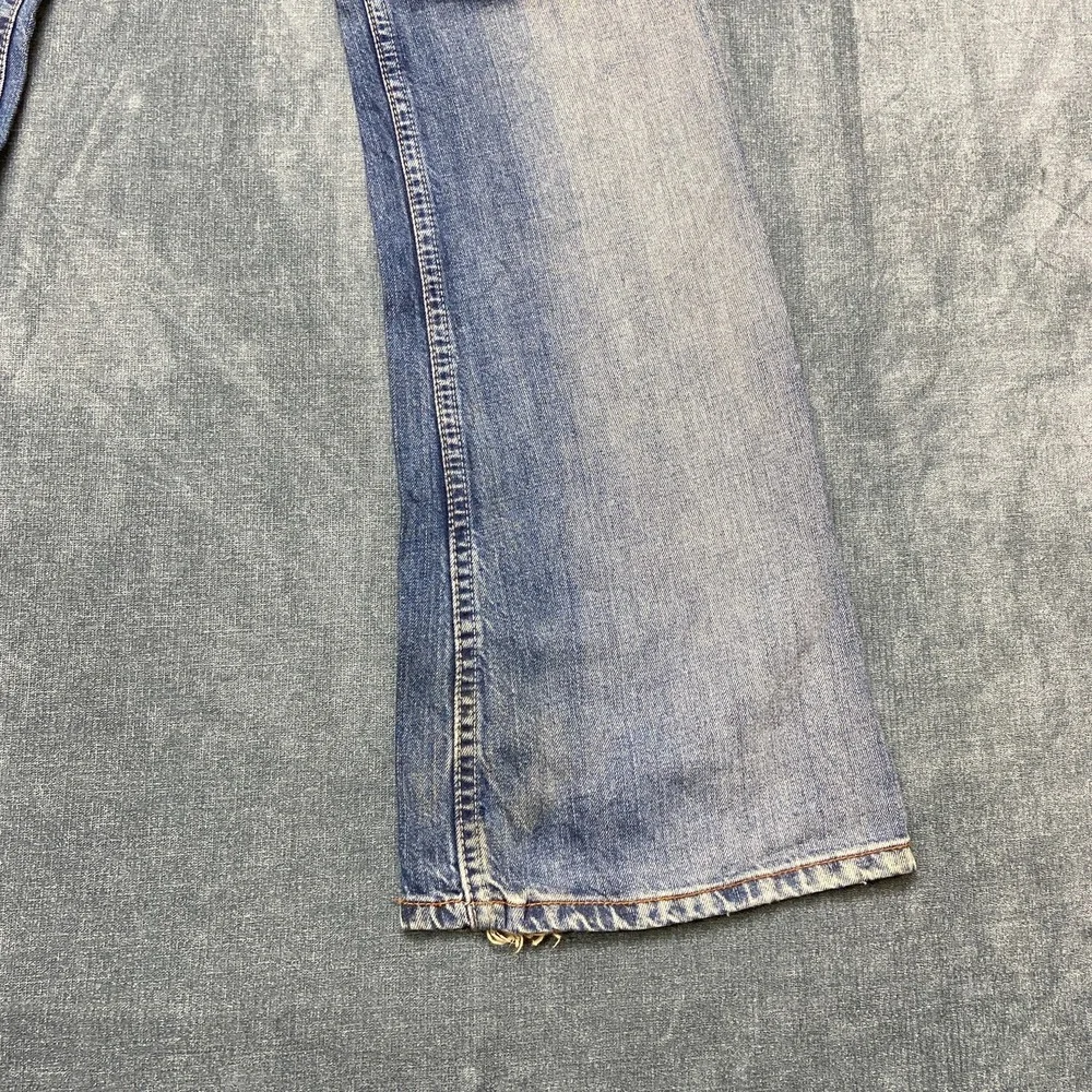 Vintage Levi's 569 Jeans Women 03 30x32 Blue Denim Medium Wash Flare Leg Raw Hem